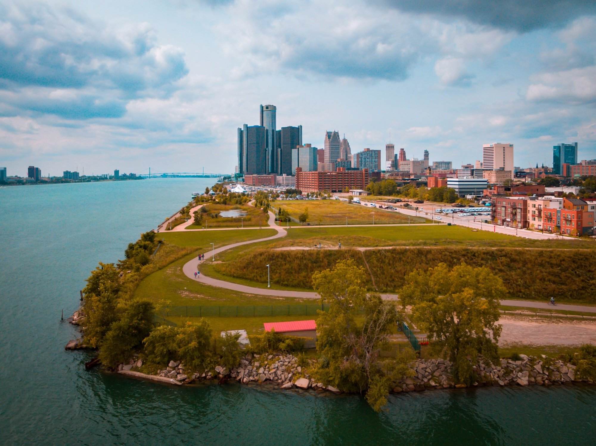 An aerial view of the detroit skyline on a cloudy day.